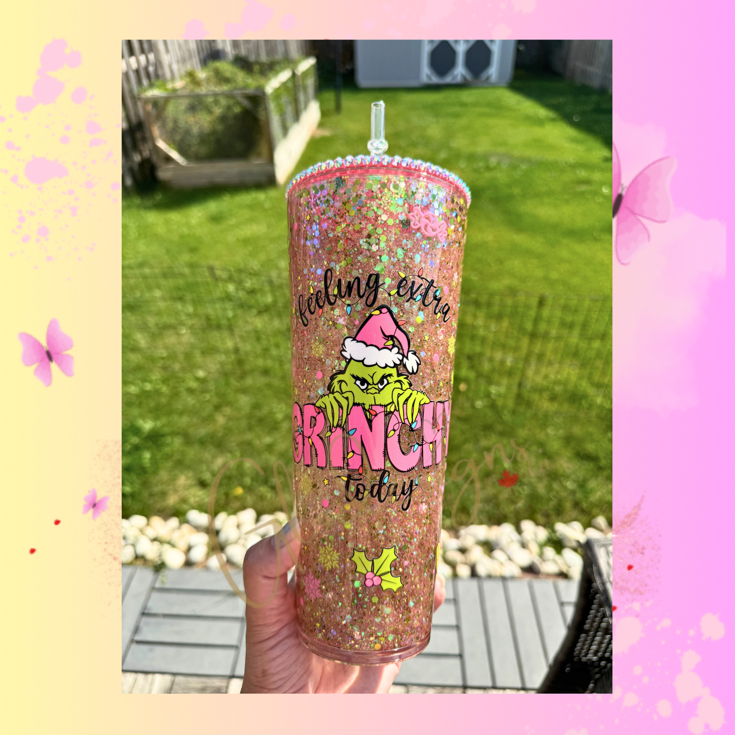 Grinchy Snowglobe 24 oz., suspended style.